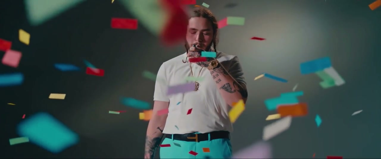 Post Malone framed by falling confetti in the finished Congratulations video